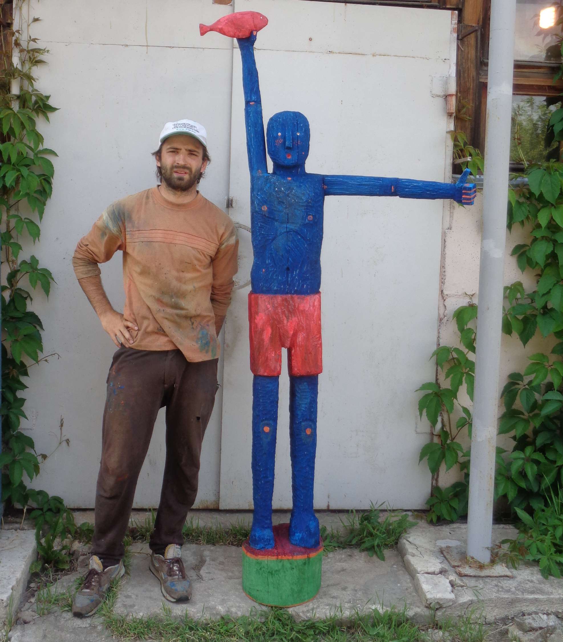 Fisherman sculpture in wood and acrylic
