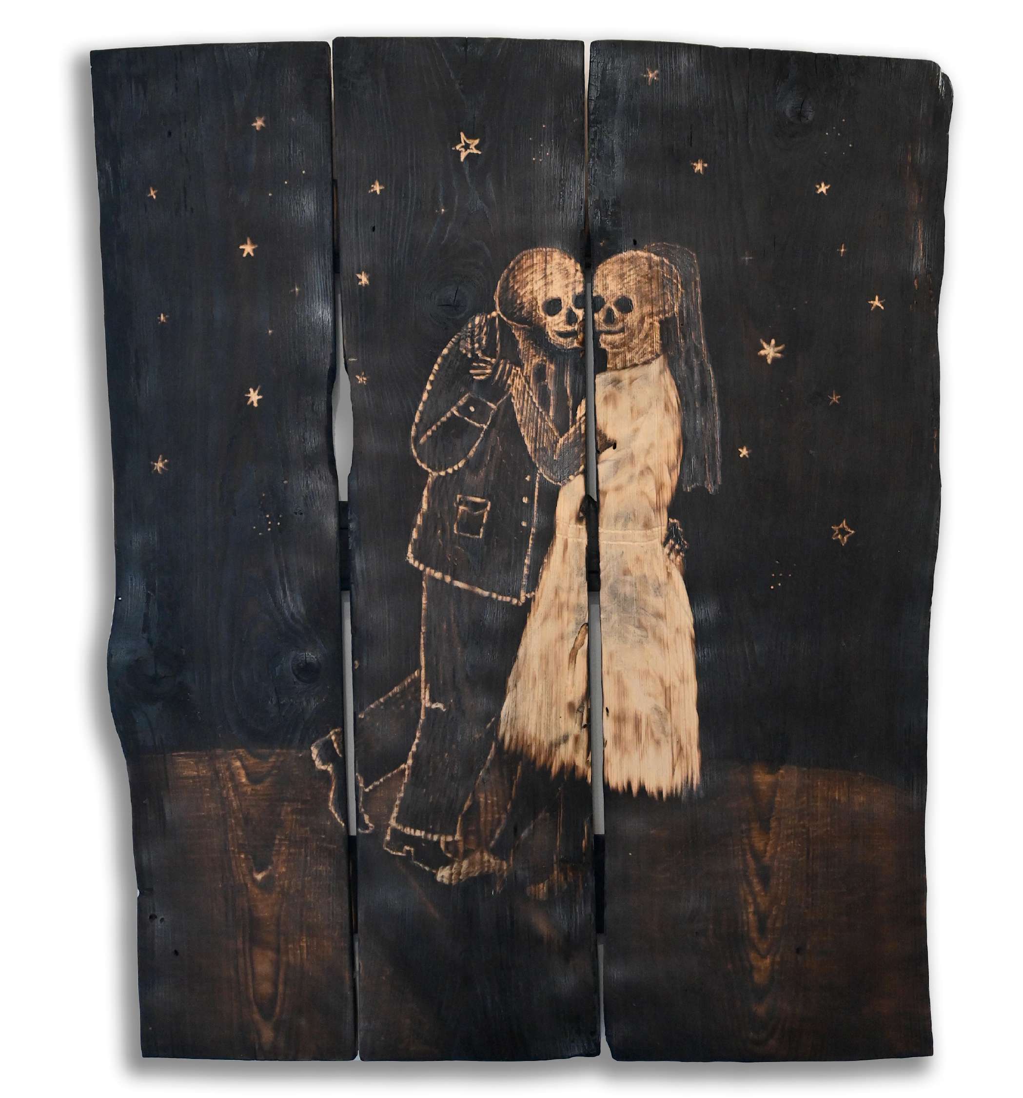 Lovers, carved into a burnt wooden board